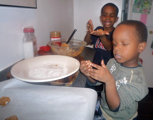 kids baking peanut butter cookies from scratch